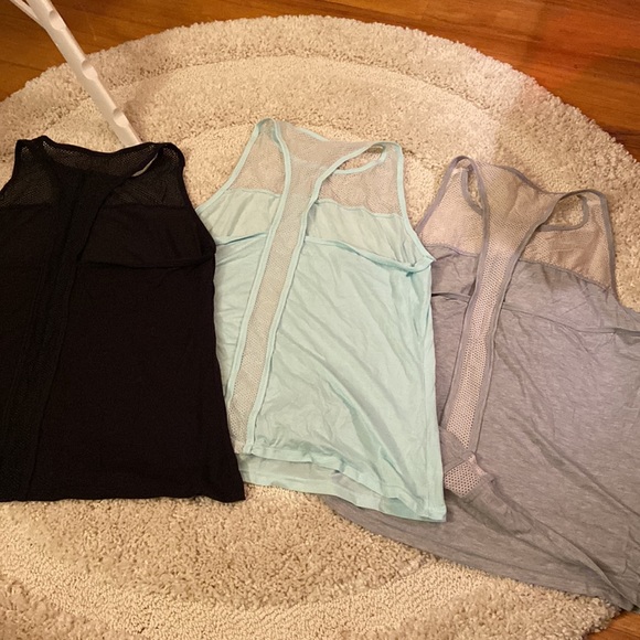 Set of 3 Athleta unstinkable tanks - Picture 2 of 5